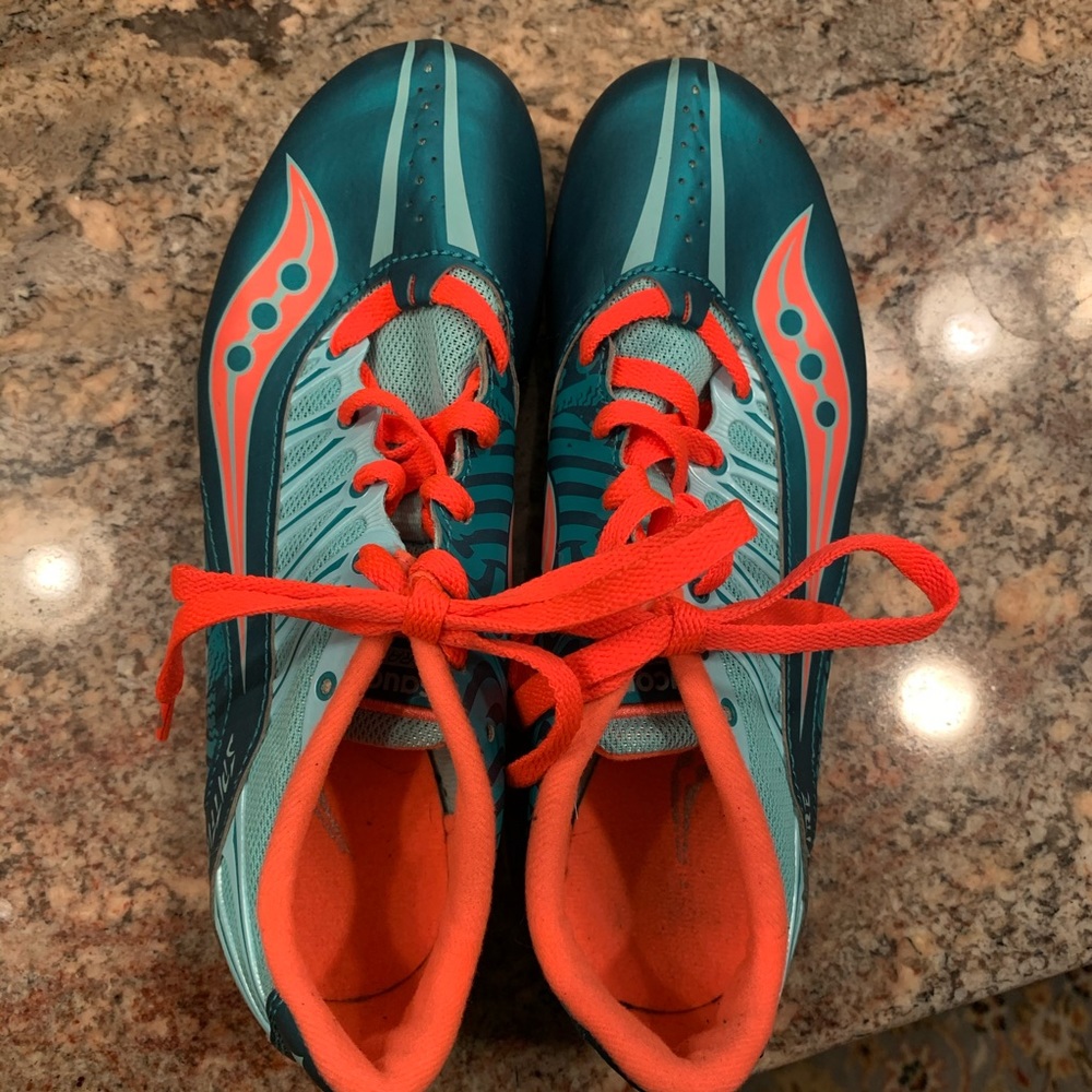 Running shoes with spikes